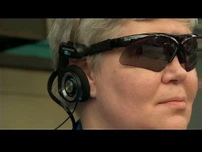 Blind user of The vOICe wearing video sunglasses