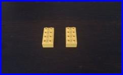 Two DUPLO bricks side by side