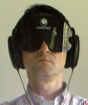 Mindfold plus headphones, or Darth Vader?